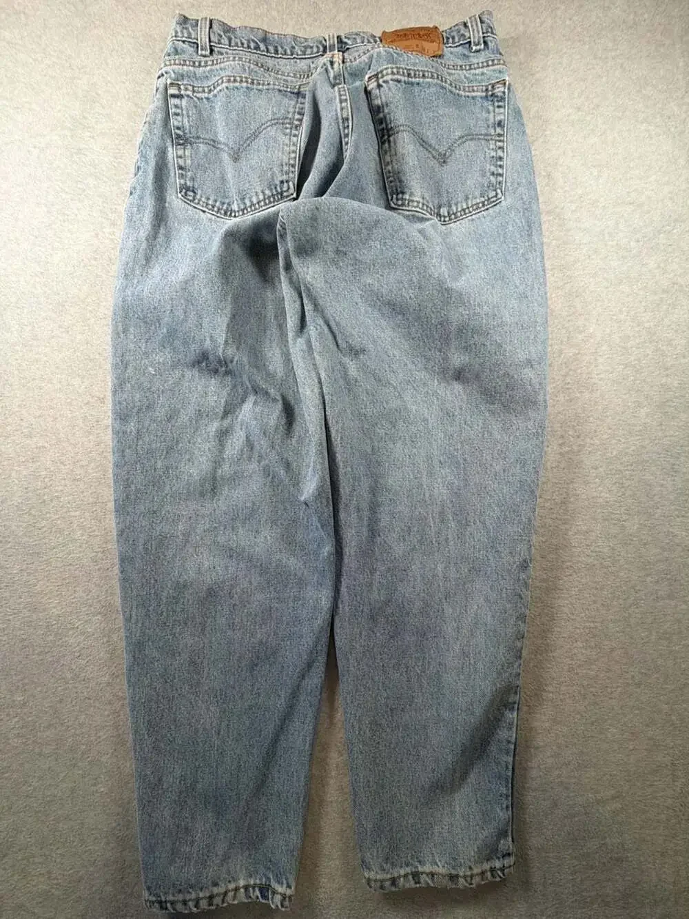 Vintage Levi's 560 Loose Fit Tapered Leg Jeans Men's 38x32 Light Wash